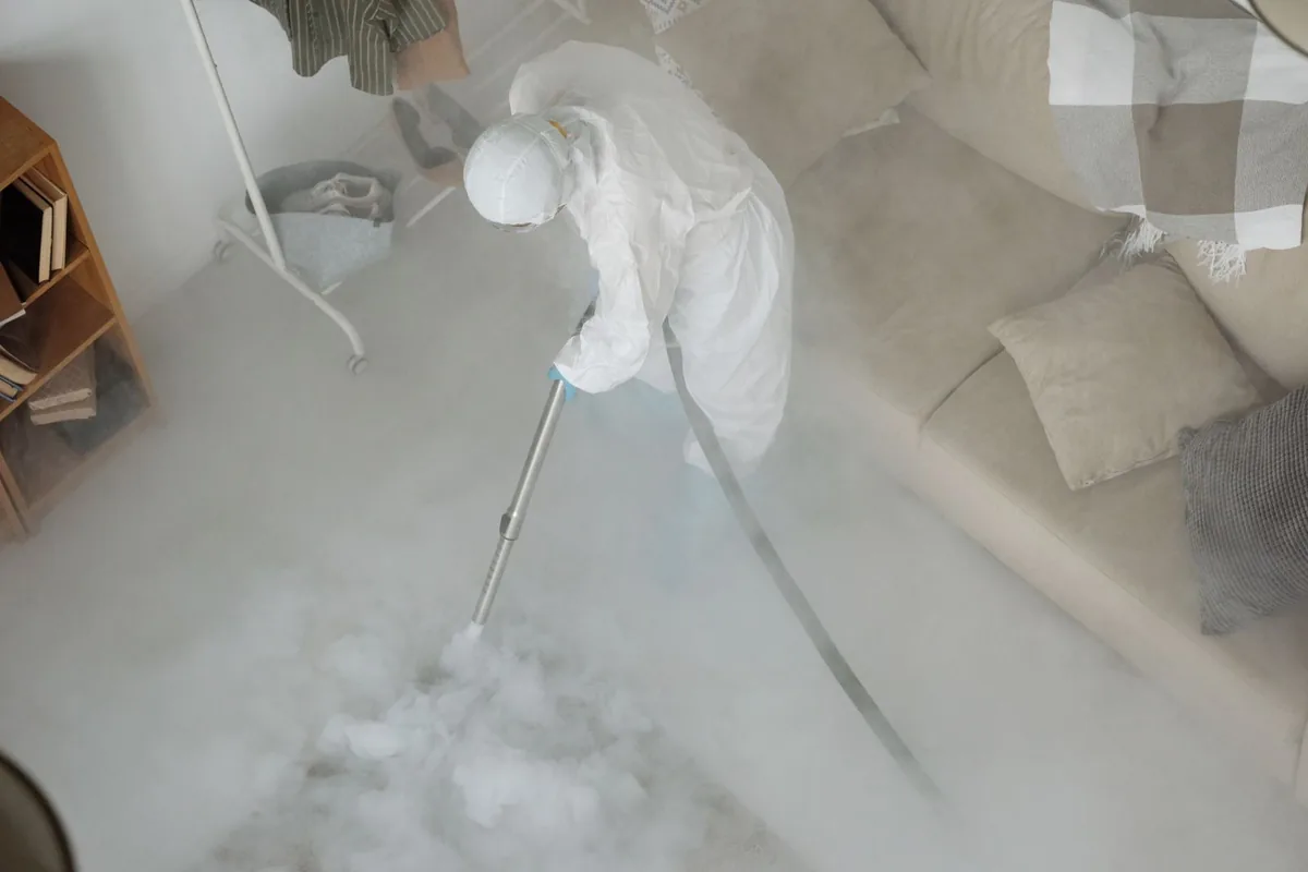 Biohazard cleanup technician in protective equipment, New Union, TN